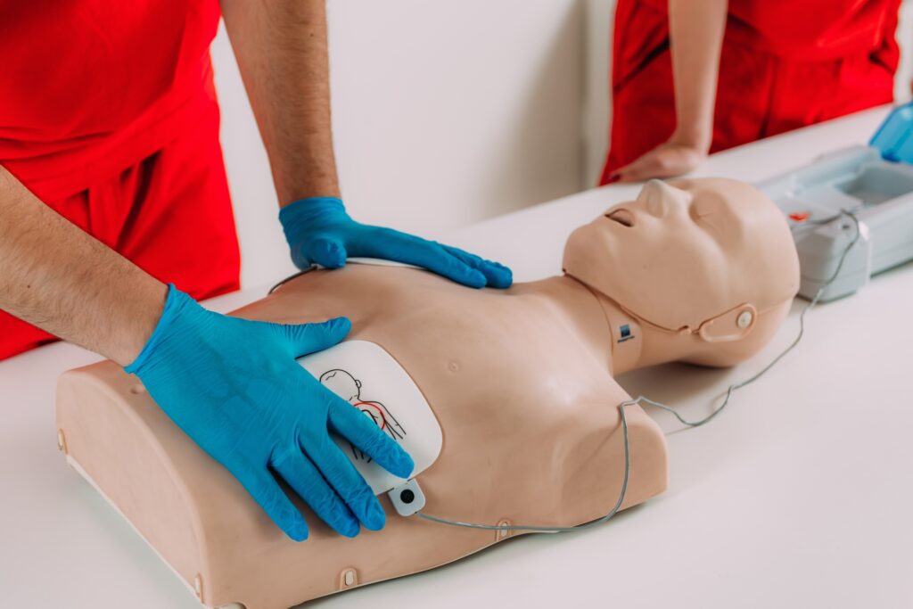 AED first aid resuscitation course. Life saving skills in a first aid resuscitation course
