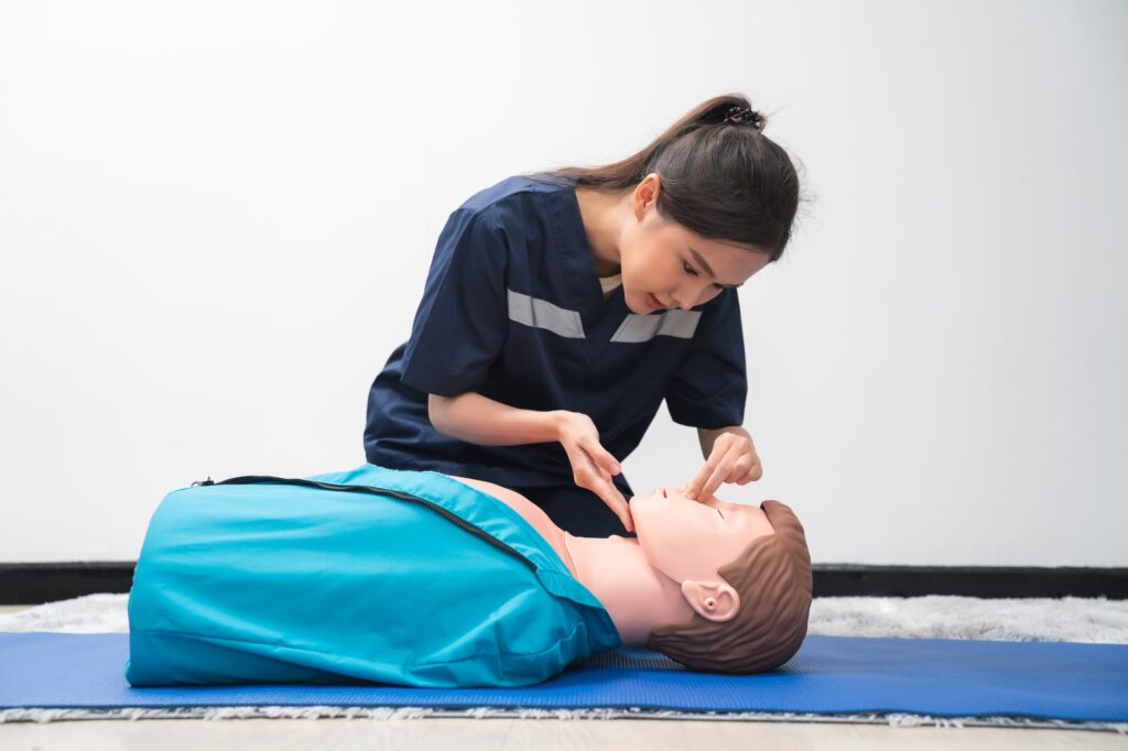 CPR Training ,Emergency and first aid class on cpr doll, Cardiopulmonary resuscitation,