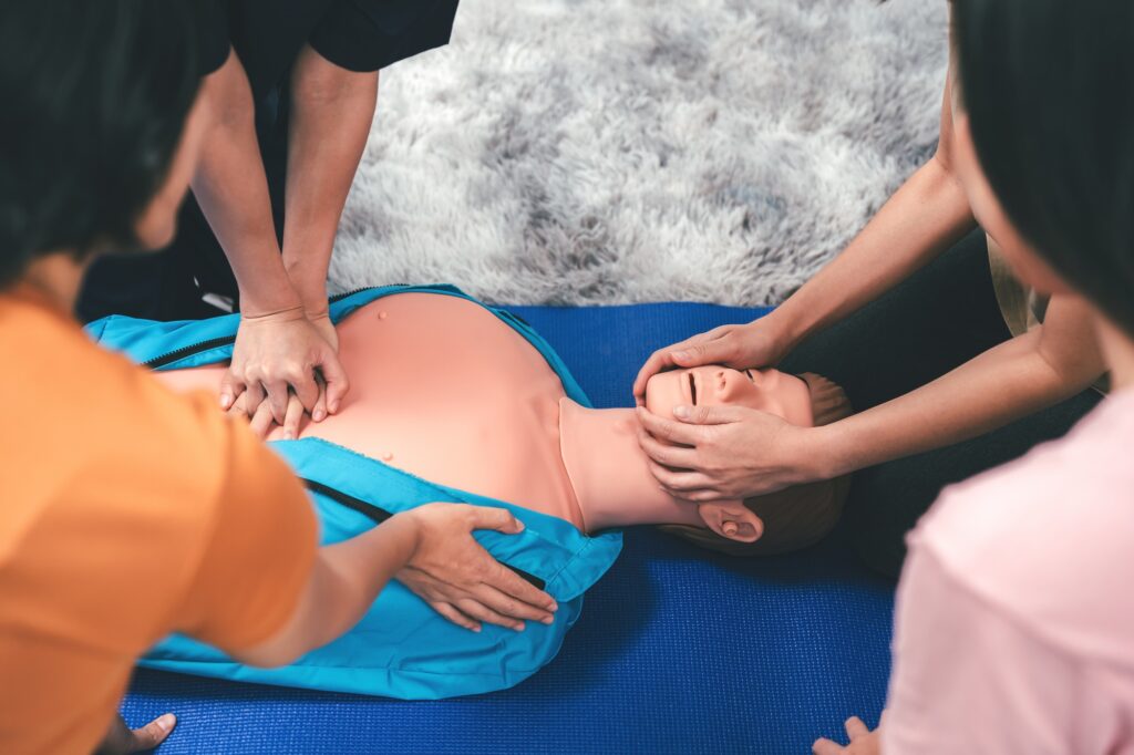 CPR Training ,Emergency and first aid class on cpr doll, Cardiopulmonary resuscitation, One part of